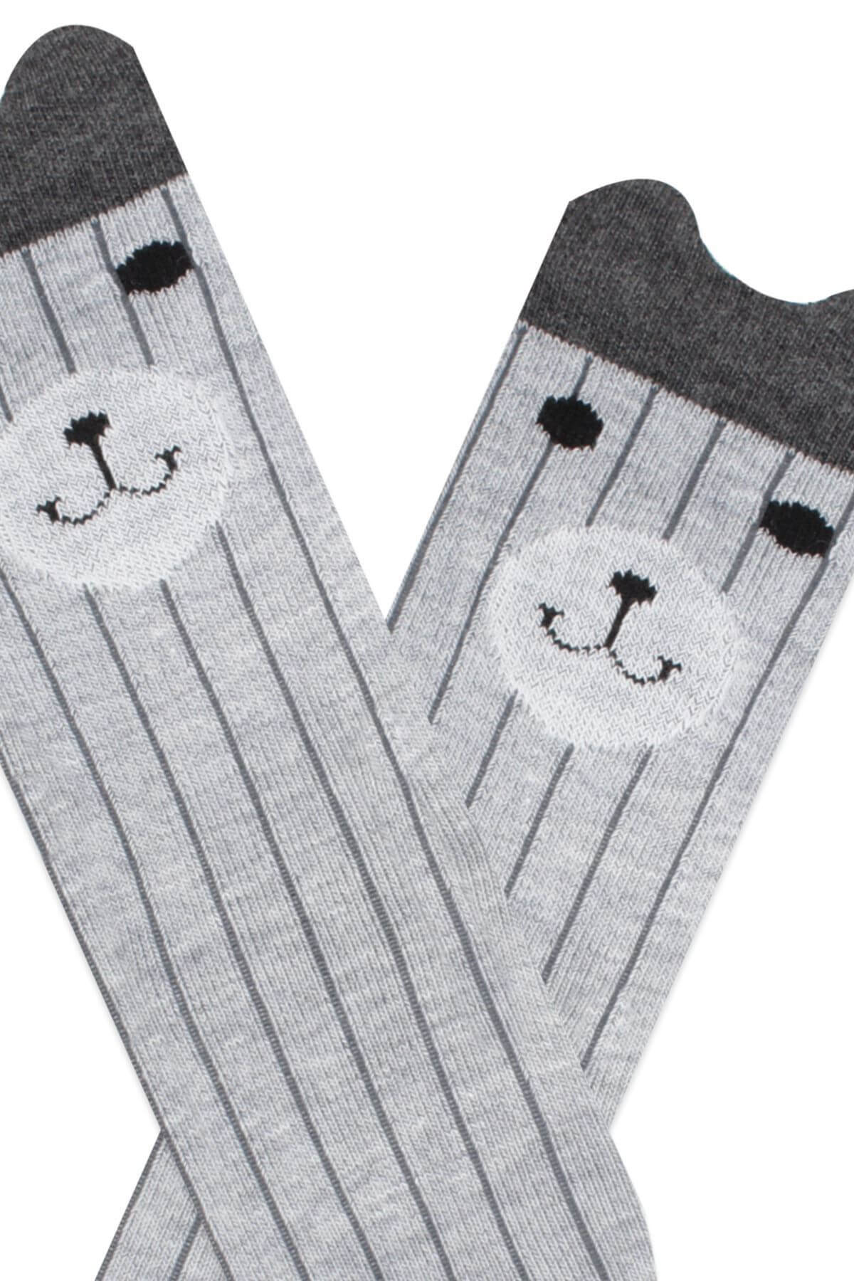 kids' 3D knee-high bear socks, showcasing adorable and lifelike bear designs for a cute and playful touch to the outfit.