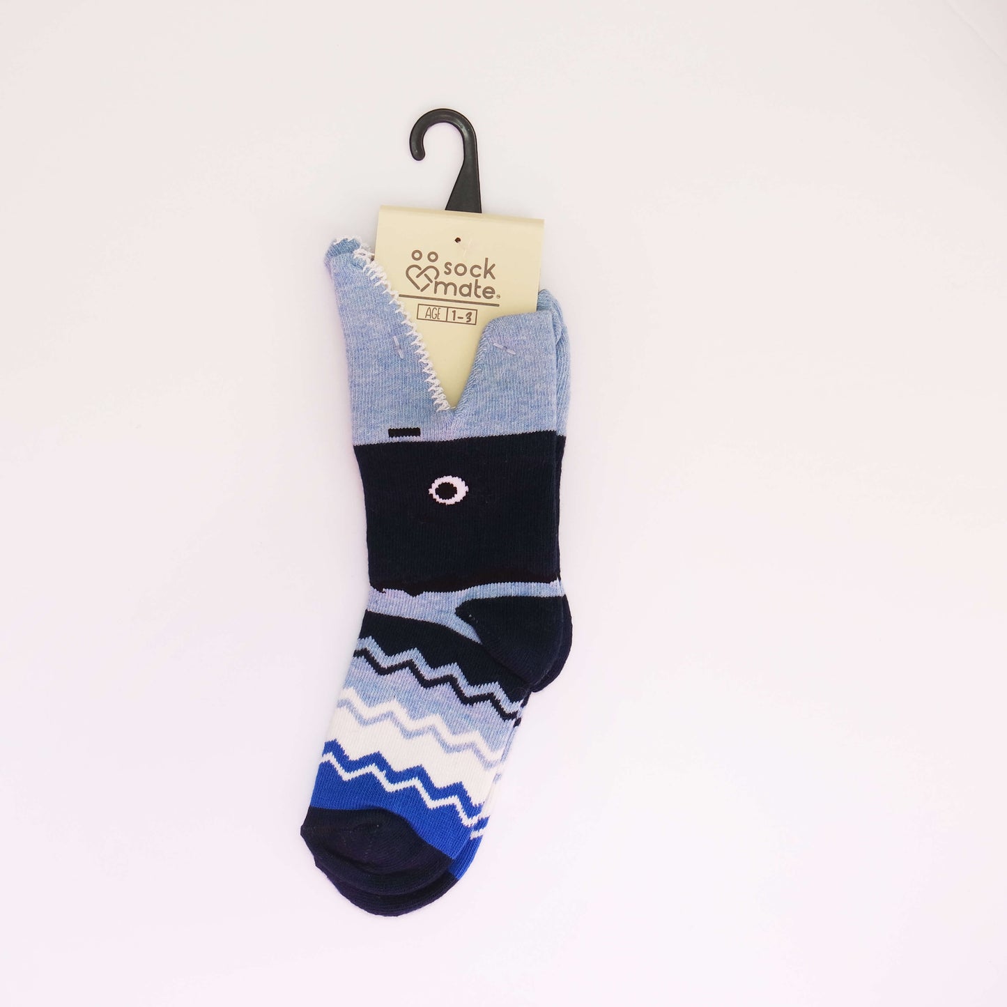 3D blue color shark socks, a labeled product with cute and lifelike shark designs for a playful and adventurous look.