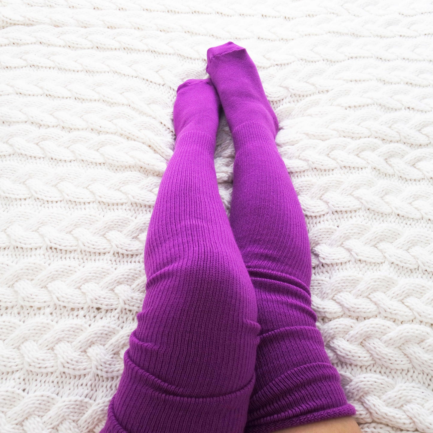 purple plus size thigh high socks, offering a stylish and versatile accessory for individuals with curvier legs.