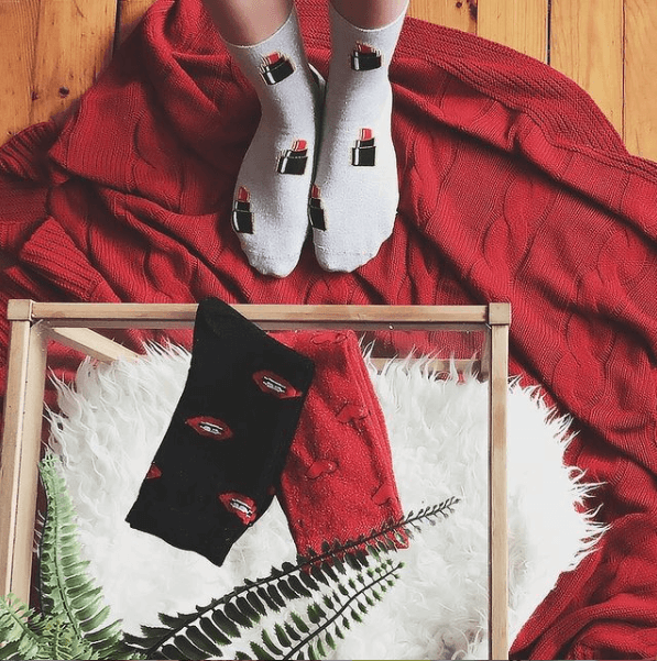 women's glitter socks with heart, lipstick, and lips patterns, adding a touch of glamour and charm to the design.