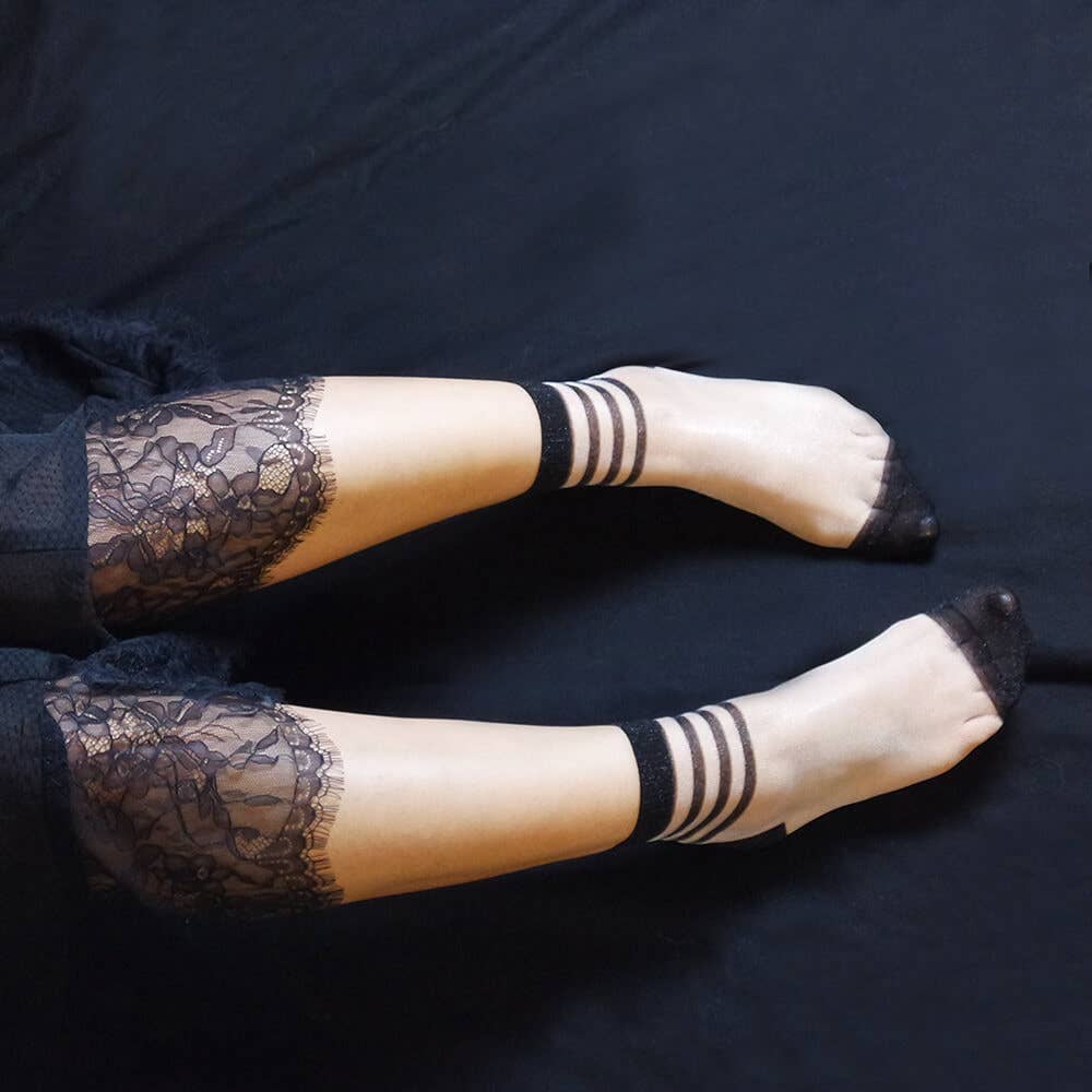black striped sheer socks for women, featuring a stylish and elegant design with sheer stripes for a chic look.