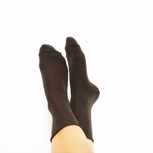brown glitter socks, offering a sparkling and stylish accessory to elevate any outfit with a touch of shimmer.