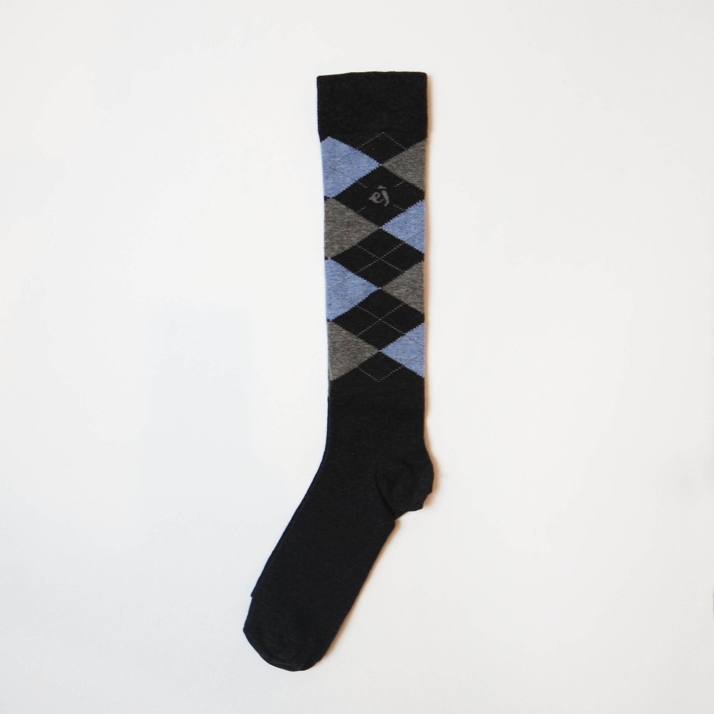showcasing colorful argyle knee-high socks for women, a versatile and chic addition to any wardrobe.