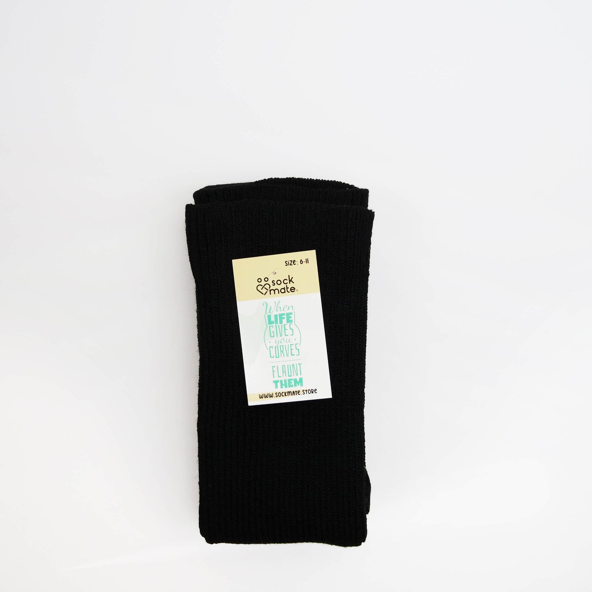 plus size woman wears ribbed style thigh high socks