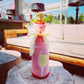  illustrating a step-by-step guide for DIY wine bottle wrapping, a creative and personalized way to present gifts.