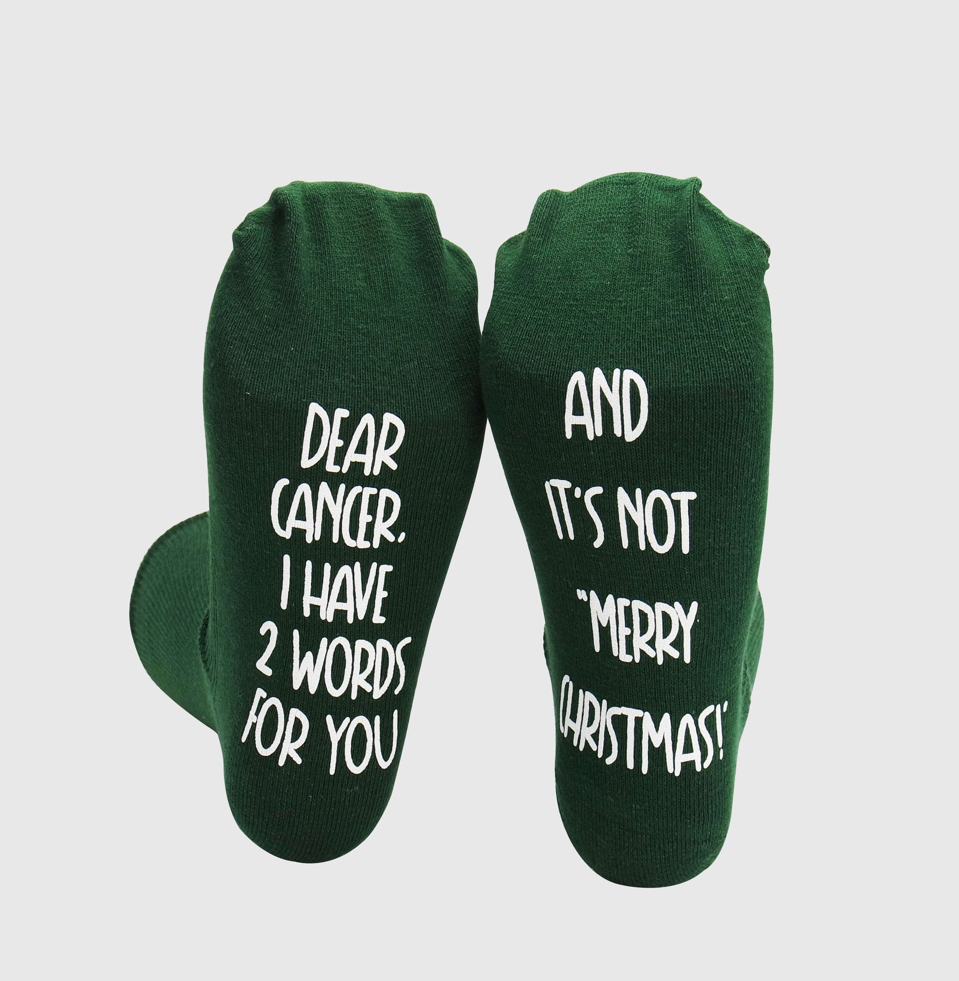 socks boldly expressing defiance towards cancer, serving as a symbol of unwavering strength.