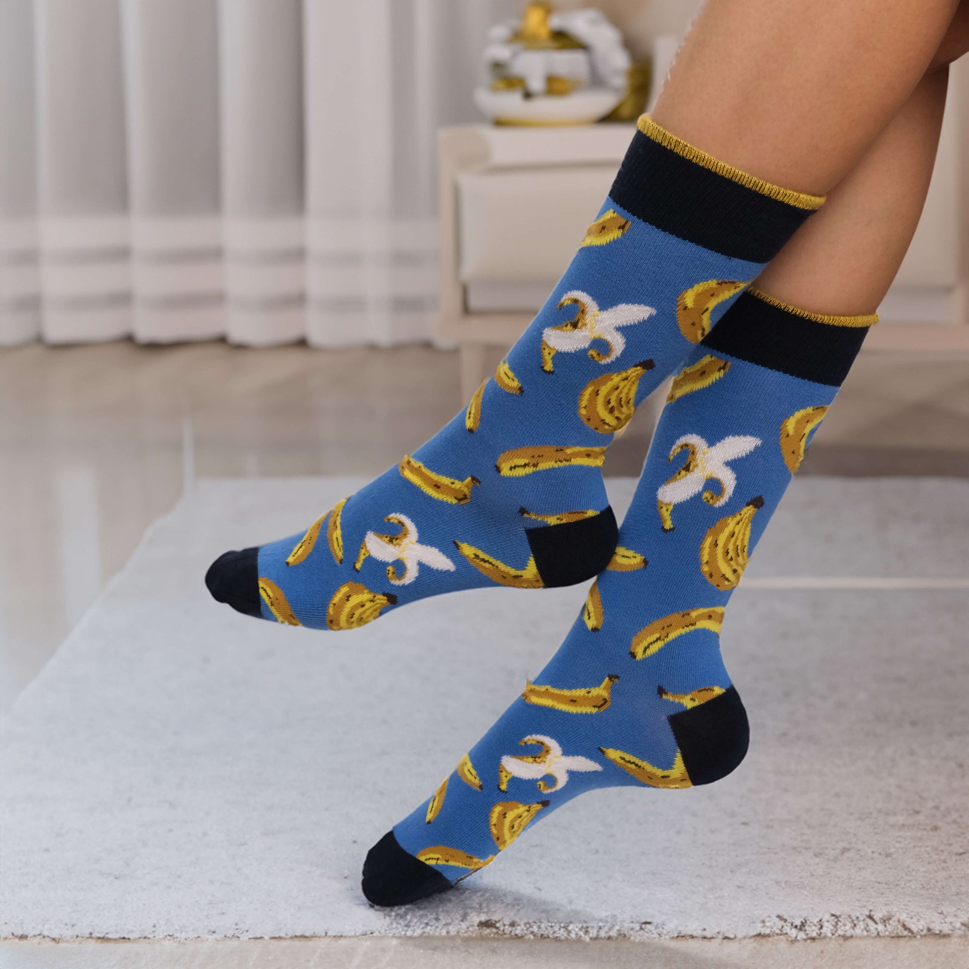 Add a touch of quirkiness to your wardrobe with these patterned socks. The design includes bananas, hotdogs, beer mugs, cheese, hot sauce, and avocados – a conversation starter for sure!