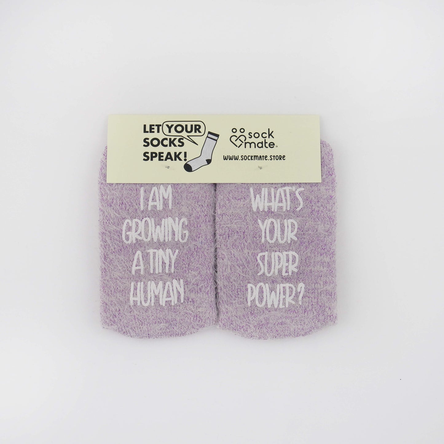 Socks with a humorous message about pregnancy, emphasizing the importance of self-care while growing a tiny human.