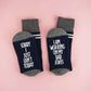 Socks with a witty and playful phrase, indicating the wearer's current focus on developing their dad joke repertoire: 'Sorry I just can't today, I am working on my dad jokes.