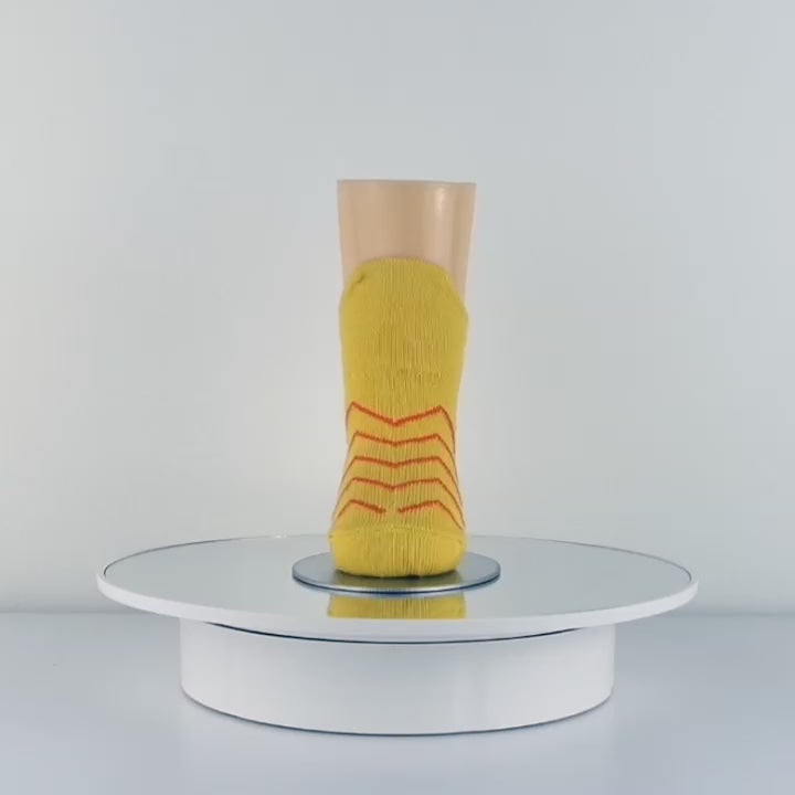 Video of 3D yellow baby fish socks, featuring adorable fish design and a playful three-dimensional effect.