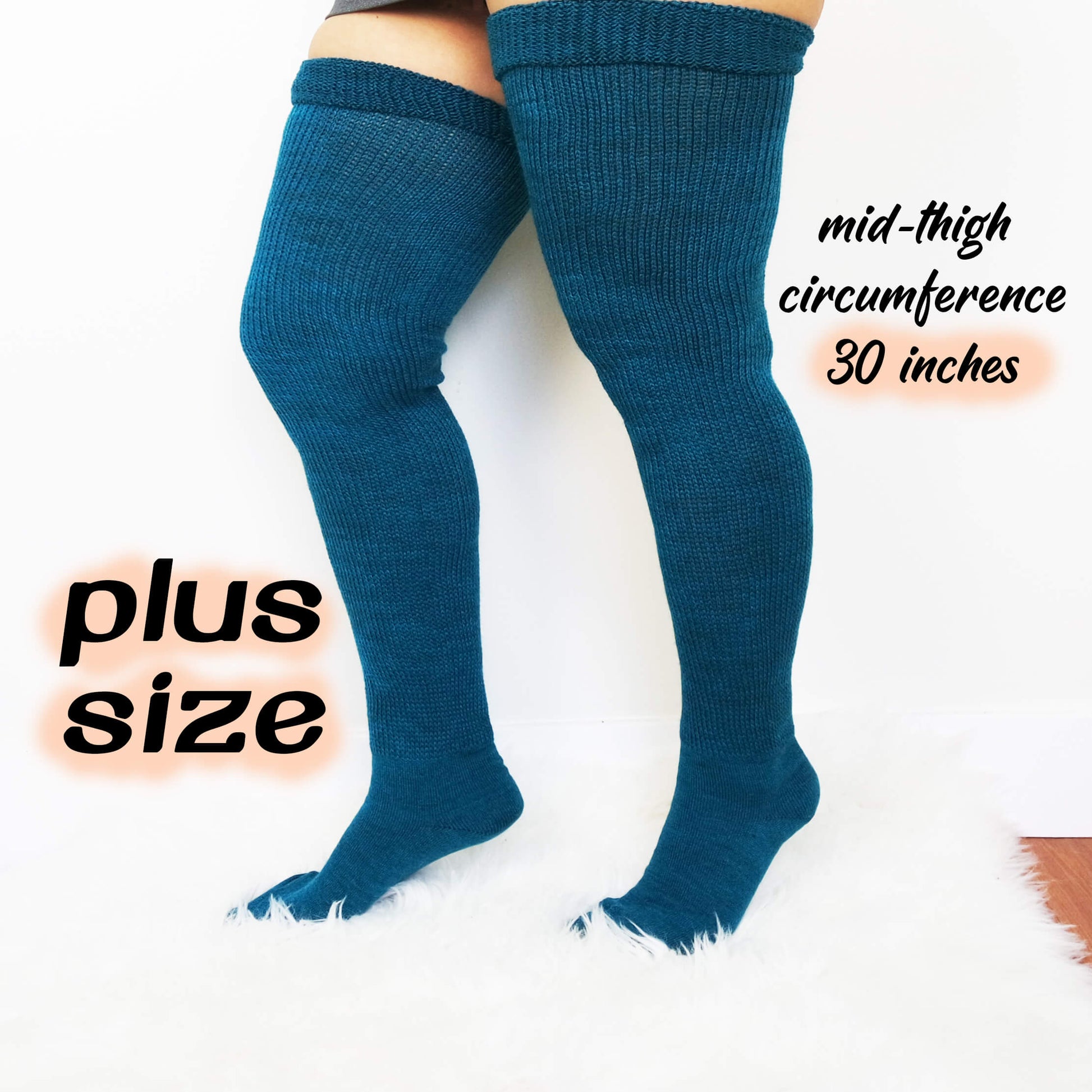 a woman wears teal color plus size thigh high socks this over knee socks makes her cozy and sexy